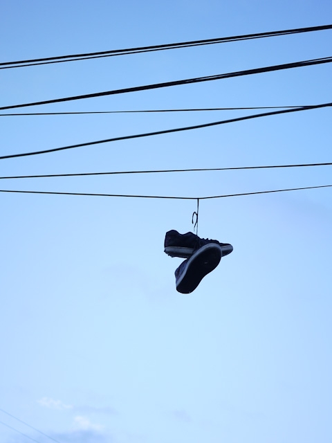 march 2011 shoes sneakers hanging power lines