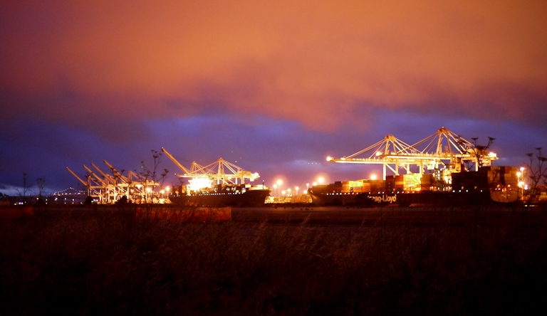 oakland docks night sky cargo ships